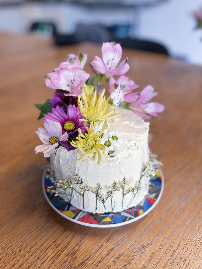 chocolate and vanilla birthday cake with flowers