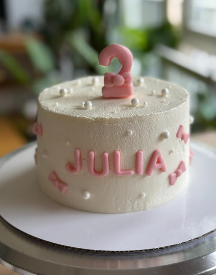 kid birthday cake with custom fondant toppers