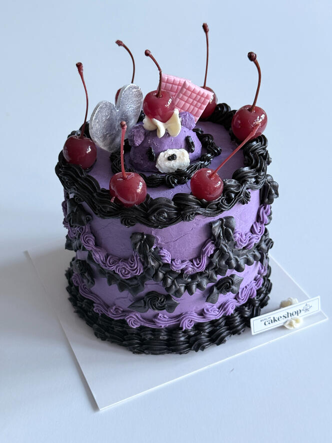 Custom purple bear and cherry cake