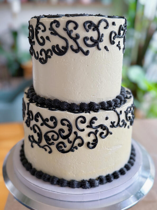 custom birthday cake with trellis scroll design