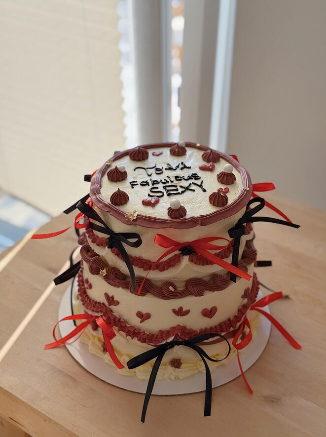 2 tiered custom vintage cake with bows